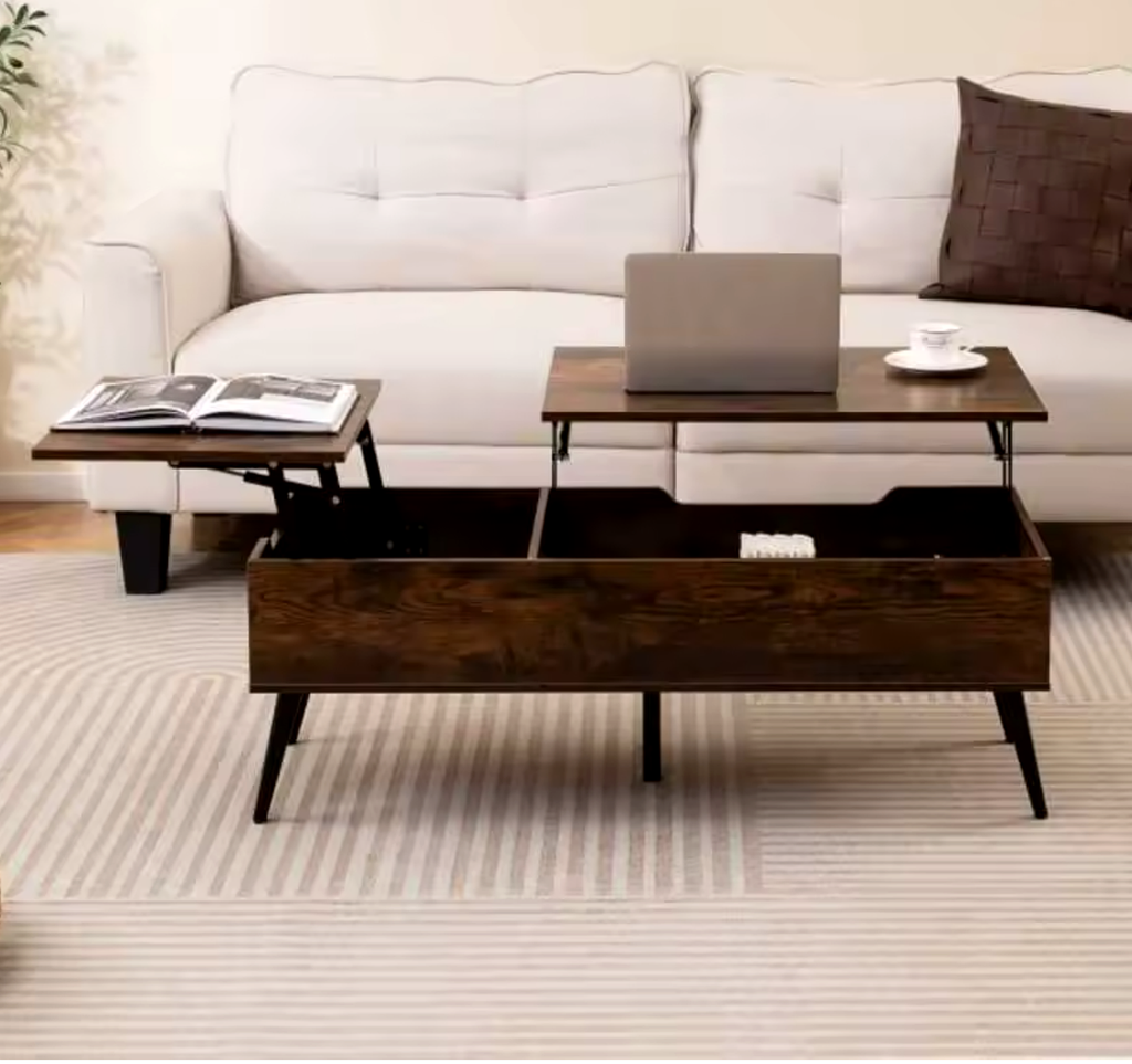 Table basse relevable Kadria avec plateaux ouverts et livre dans un salon lumineux