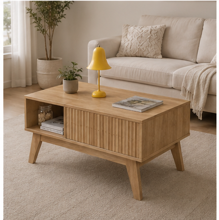 Table basse Kalvia avec lampe et livre dans un salon lumineux